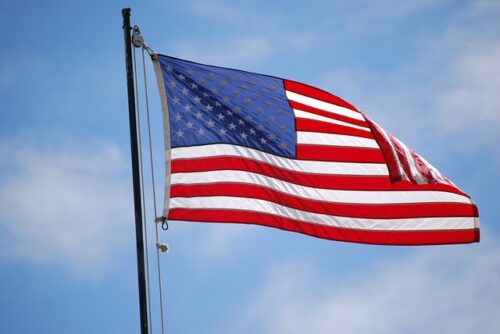 united states flag against a blue sky